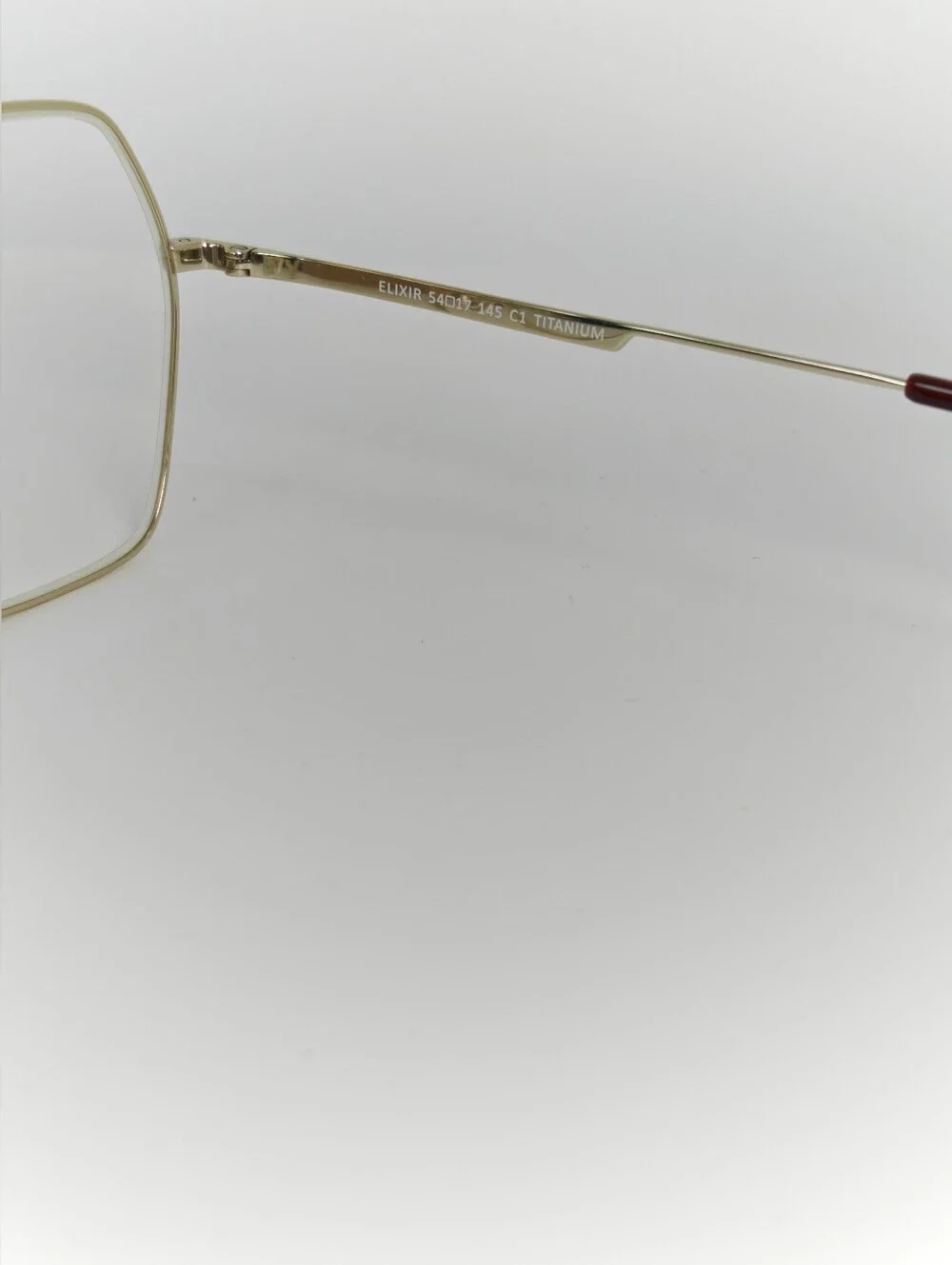 Elixir. Titanium.Gold Polygon. Metal Frame Women's Eyewear.